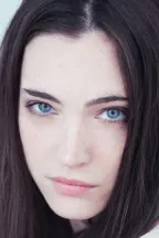 Она Косамикела