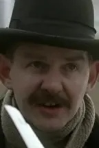 Джон Комер